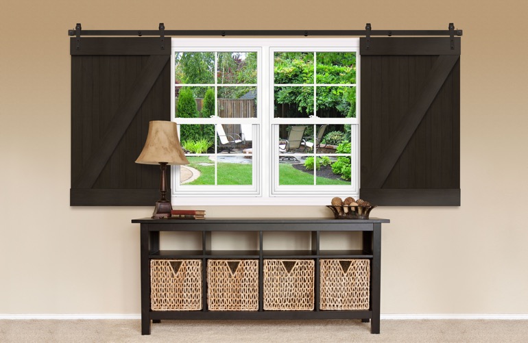 Sliding Barn Doors As A Window Treatment In St. George Dark sliding barn doors covering a window